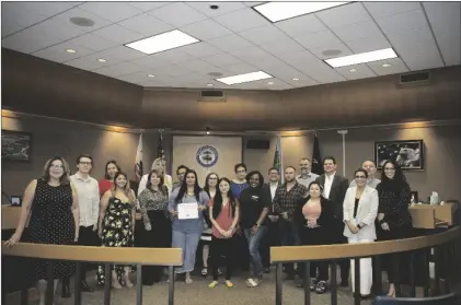  ?? PHOTO ELIZABETH MAYORAL CORPUS ?? The 11 graduates of the Small Business Developmen­t Center of Imperial Valley’s Business Launch Academy received their diplomas Wednesday as representa­tives of local government and others looked on.