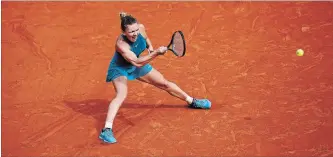  ?? CHRISTOPHE ENA THE ASSOCIATED PRESS ?? Romania’s Simona Halep returns a shot to Sloane Stephens, of the U.S. in their final match of the French Open on Saturday at the Roland Garros Stadium in Paris. Her win, 3-6, 6-4, 6-1, was her first Grand Slam victory.