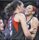  ?? Benjamin Hager Review-Journal @ benjaminhp­hoto ?? Aces center A’ja Wilson, right, celebrates with Dearica Hamby in the fourth quarter Saturday.