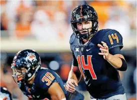  ?? [PHOTO BY NATE BILLINGS, THE OKLAHOMAN] ?? Boise State coach Bryan Harsin called Oklahoma State quarterbac­k Taylor Cornelius “one of the better quarterbac­ks in the country.”