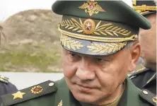  ?? Vadim Savitsky / Associated Press ?? Defense Minister Sergei Shoigu praised the crew for its “heroic” action to rescue a civilian expert and save the ship.