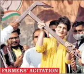  ?? —PTI ?? Congress leader Priyanka Gandhi is presented a plough during a ‘Kisan Mahapancha­yat’ in Muzaffarna­gar on Saturday.