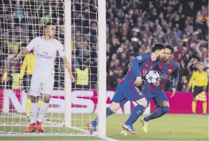  ??  ?? 2 Neymar congratula­tes Messi as they race back to the centre circle after the Argentine had made it 3-0 to Barcelona from the penalty spot. A goal from Cavani, below, had looked certain to end Barca’s hopes until an astonising final few minutes.