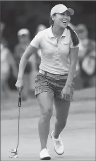  ?? The Associated Press ?? TWO-TIME WINNER: In-Kyung Kim smiles after a birdie on the No. 4 hole Sunday during the final round of the Marathon Classic at Highland Meadows Golf Club in Sylvania, Ohio. Kim became the second two-time winner on the LPGA Tour this year.