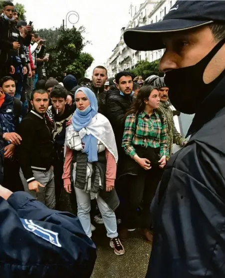  ?? Photo RYAD KRAMDI. AFP ?? Manifestat­ion à l’occasion des deux ans du Hirak, à Alger, le 22 février.