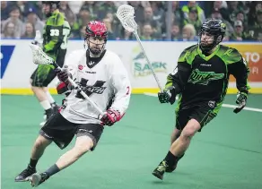  ?? — KAYLE NEIS FILES ?? The WLA’s Burnaby Lakers featured several key members of the National Lacrosse League’s Vancouver Stealth on its team this summer, including Stealth captain Matt Beers, left.