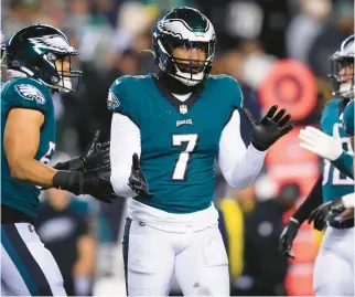  ?? MATT ROURKE/AP ?? Philadelph­ia linebacker Haason Reddick, center, led the Eagles with 16 sacks in the regular season.