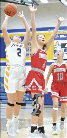  ?? Staff photo/ Jake Dowling ?? St. Marys’ Haley Felver ( 2) goes up for a layup in front of New Knoxville’s Avery Henschen during Saturday’s non- conference girls basketball game.