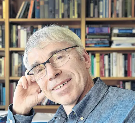  ?? PHOTO PETER MCINTOSH ?? Worldlywis­e . . . Bill Harris in his University of Otago politics department office.