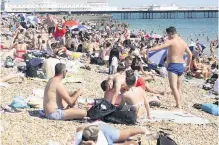  ??  ?? BUSY
Beach at Brighton was thronged with visitors