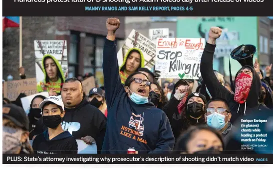  ?? ASHLEE REZIN GARCIA/ SUN-TIMES ?? Enrique Enriquez (in glasses) chants while leading a protest march on Friday.