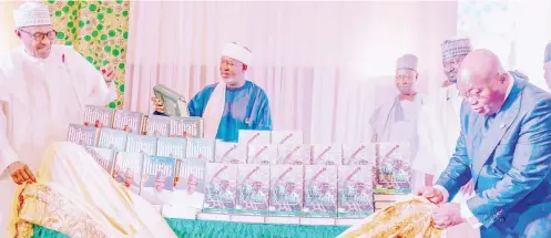  ?? PHOTO: NAN ?? President Muhammadu Buhari (L) and his Ghanaian counterpar­t, Nana Akufo-Ado unveiling the books “State of Repair: How Buhari tried to change Nigeria for good” by Antony Goldman and “The Legacy of Muhammadu Buhari” by Sen Abu Ibrahim during the public presentati­on and launching of the two books at the Presidenti­al Villa in Abuja on Friday