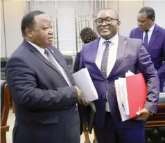  ?? ?? Informatio­n, Publicity and Broadcasti­ng Services Minister, Dr Jenfan Muswere (right) chats to Foreign Affairs and Internatio­nal Trade Minister, Dr Frederick Shava (left) after the first post Cabinet media briefing of 2024 in Harare yesterday. – Picture: Edward Zvemisha