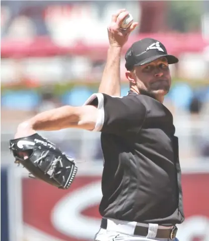  ?? | LENNY IGNELZI/AP ?? White Sox starter John Danks pitched five innings against the Padres and gave up two runs and six hits Saturday.