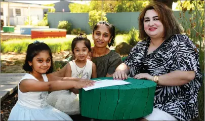  ?? Picture: PAUL CARRACHER ?? SETTLING IN: Jellybeans Playgroup co-ordinator Anubha Jall, right, with, Jiya, 4, Kriya, 2, and Dimple Kerai settle into a new home at Horsham Community House.