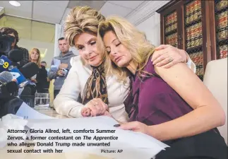  ?? Picture: AP ?? Attorney Gloria Allred, left, comforts Summer Zervos, a former contestant on who alleges Donald Trump made unwanted sexual contact with her