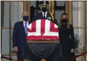  ?? — AP ?? President Donald Trump and First Lady Melania Trump pay respects as Justice Ruth Bader Ginsburg lies in repose at the Supreme Court building in Washington on Thursday.