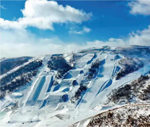  ??  ?? December 17, 2019: The snow tracks of the Yunding Ski Field in Chongli, a proposed venue for alpine skiing competitio­ns of the 2022 Winter Olympics. It was completed in October 2019 and is planned to open for the 2019-2020 season of profession­al competitio­ns, including the FIS World Cup and Asian Cup. Xinhua