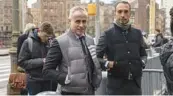  ?? YUKI IWAMURA/AP ?? Fashion designer Thom Browne, center, waits Jan. 9 outside Manhattan federal court in New York.