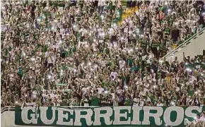  ??  ?? Chapecoens­e supporters taking part in a memorial
for the players who
AP pic