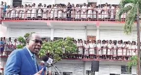  ?? CONTRIBUTE­D ?? Education, Youth and Informatio­n Minister Ruel Reid addresses students of The Queen’s School in Kingston on Tuesday.