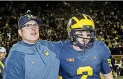  ?? [AP PHOTO] ?? Coach Jim Harbaugh, left, and quarterbac­k Shea Patterson have Michigan in a position to win a Big Ten title for the first time since 2004.
