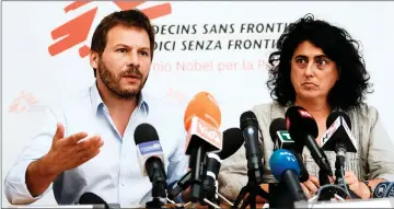  ?? — AFP photo ?? Frederic Penard, operations director for SOS Mediterran­ee (left) and Claudia Lodesani, president of Doctors Without Borders Italy (MSF), NGOs running the Aquarius rescue ship, give a press conference in Rome.