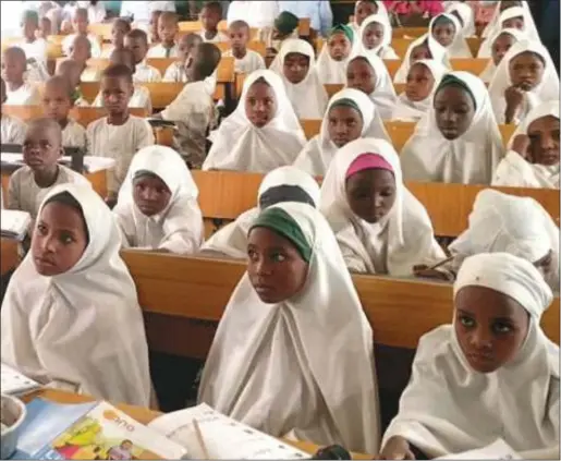  ?? ?? Pupils of Abukur Model Primary school receiving lesson