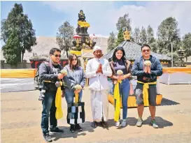  ??  ?? We were blessed to be prayed over by the Hindu Mangku at the Pura Luhur Poten temple.