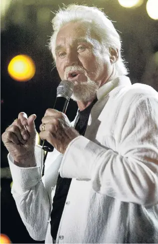  ?? PHOTO: REUTERS ?? Kenny Rogers performs at the Coliseum during the Country Music Associatio­n Music Festival in Nashville, Tennessee, in 2005.