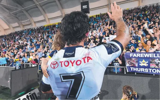  ?? Picture: DARREN ENGLAND ?? Johnathan Thurston walks from the ground after playing his final NRL game at Cbus Super Stadium on Saturday,