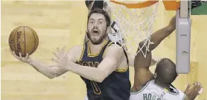  ?? CHARLES KRUPA/THE ASSOCIATED PRESS ?? Cleveland Cavaliers forward Kevin Love leads the team in the playoffs with 10.4 rebounds a night.