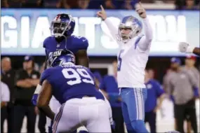 ?? JULIO CORTEZ — THE ASSOCIATED PRESS ?? Detroit Lions kicker Matt Prater (5) celebrates after kicking a field goal during the first half of an NFL football game against the New York Giants Monday in East Rutherford, N.J.