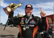  ?? PHOTO COURTESY OF NHRA ?? Shawn Langdon celebrates after winning the NHRA Gatornatio­nals on March 10in Gainesvill­e, Fla.