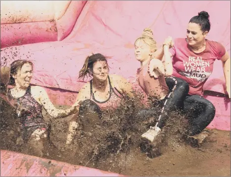  ??  ?? HAPPIER TIMES
Having fun at a previous Pretty Muddy event