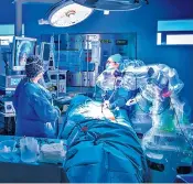  ?? ?? Surgical robots are already a reality but the biggest advances could be in saving time for doctors and nurses