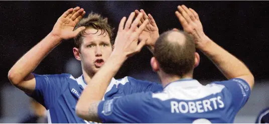  ??  ?? Anthony Miley (left) bagged City’s winner in added time at Cefn Druids last Friday