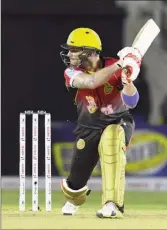  ??  ?? Trinbago Knight Riders’ Brendon Mc Cullum hits a six during his knock of 91 Saturday night against the Jamaica Tallawahs. (CPL T20 via Getty Images)