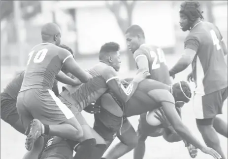  ?? (Orlando Charles photo) ?? Action between the Guyana Defence Force and Falcons in Sunday’s GRFU’s Bounty Farm 15s league at the National Park.