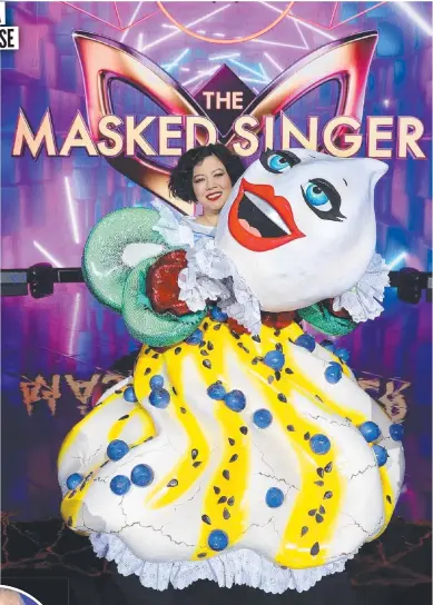  ?? ?? Singer Mahalia Barnes revealed as the Pavlova in The Masked Singer; left Jackie O shocked to see Kyle Sandilands revealed as Rubble from Paw Patrol; below, Lote Tuqiri as The Pinata.