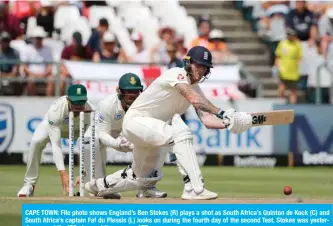  ??  ?? CAPE TOWN: File photo shows England’s Ben Stokes (R) plays a shot as South Africa’s Quinton de Kock (C) and South Africa’s captain Faf du Plessis (L) looks on during the fourth day of the second Test. Stokes was yesterday named the ICC player of the year. — AFP