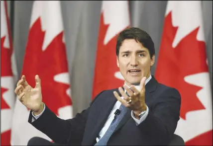  ?? CP PHOTO ?? Prime Minister Justin Trudeau’s government is under pressure from opposition parties to do more to protect privacy as policy-makers grapple with the implicatio­ns of using online data for political purposes.