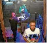  ?? DAYTON POLICE DEPARTMENT ?? A screen capture from surveillan­ce video provided by the Dayton Police Department shows shooter Connor Betts (center, right) entering Ned Peppers about 50 minutes before he opened fire, killing nine.