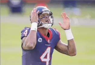  ?? Kamil Krzaczynsk­i / Associated Press ?? Houston Texans quarterbac­k Deshaun Watson has made it clear that he wants out after being unhappy with the direction of the team for some time.
