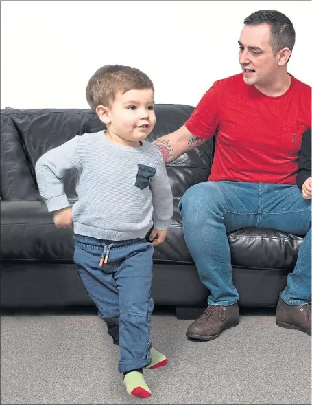  ??  ?? Nick Sanderson at home with his children, Henry, four and two-year-old Ellis in Alford, Aberdeensh­ire