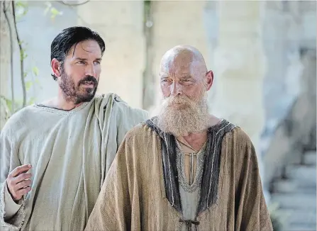  ?? COLUMBIA PICTURES ?? Jim Caviezel, left, plays Luke and James Faulkner is his colleague Paul in the biblical drama, “Paul, Apostle of Christ.”