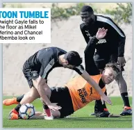  ??  ?? TOON TUMBLE Dwight Gayle falls to the floor as Mikel Merino and Chancel Mbemba look on