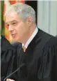  ?? THE MORNING CALL FILE PHOTO ?? Judge Stephen G. Baratta speaks after a swearingin ceremony. Baratta’s resignatio­n will be effective Jan. 1.