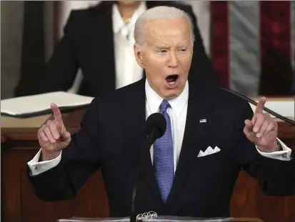  ?? ANDREW HARNIK — THE ASSOCIATED PRESS ?? President Joe Biden delivers the State of the Union address to a joint session of Congress at the U.S. Capitol on March 7in Washington.