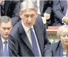  ??  ?? > Philip Hammond in the Commons